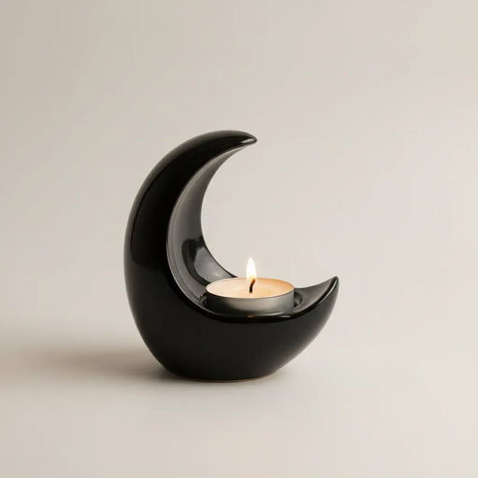 Luna crescent moon Black candle holder in glossy black ceramic by Ideal Design. Handmade celestial tea light holder and minimalist souvenir from Lebanon.